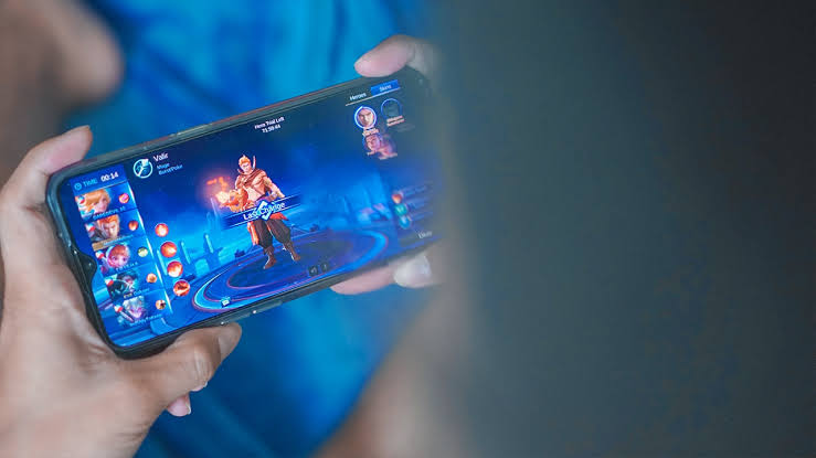 Mobile gaming demonstration shown on a smartphone screen during a technology showcase