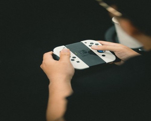 Console controller in hands during an exhibition
